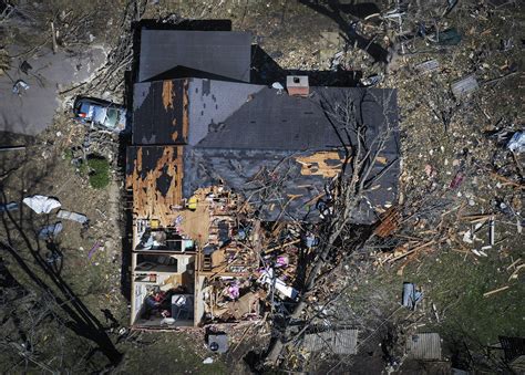 32 dead as tornadoes torment from Arkansas to Delaware